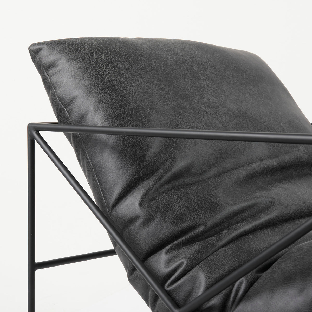Leonidas Black Faux Leather Accent Chair